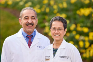 Farshid Guilak, PhD, and Christine Pham, MD, collaborate on research together. They were photographed on March 13, 2024. MATT MILLER/WASHINGTON UNIVERSITY SCHOOL OF MEDICINE