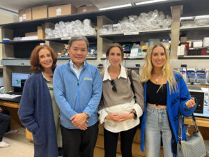 WashU Medicine’s Kian-Huat Lim, MD, PhD, second from left, welcomed members of the Nussbaum family to his research lab. (Courtesy photo)