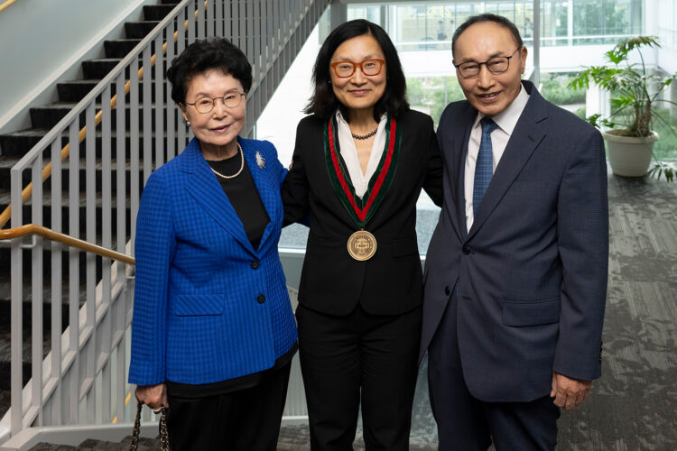 Kyung Ja Shin Lee, MD, PhD, left, and Won Ro Lee, MD, right, paid their first visit to St. Louis in July to witness the installation of their daughter, Janet Lee, MD, as WashU Medicine’s Selma and Herman Seldin Distinguished Professor in Medicine. (Photo: Dan Donovan/WashU Medicine)
