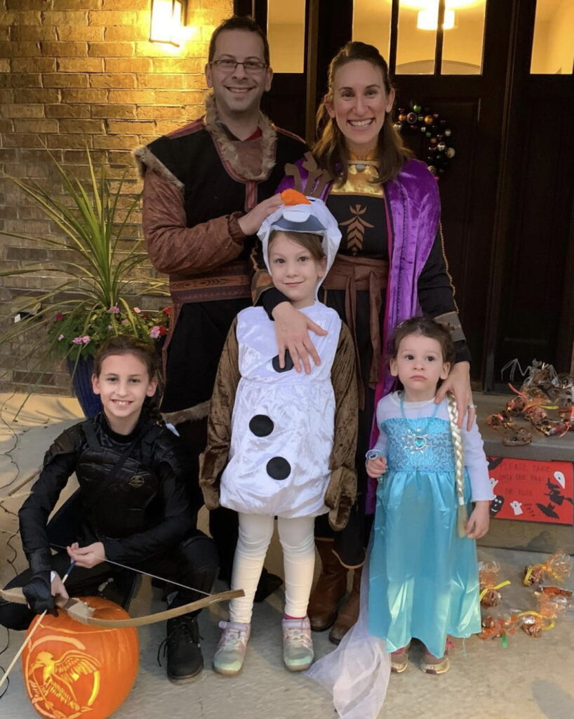 Ilana Rosman with her husband, pediatric dermatologist Leo Shmuylovich, and daughters, Vera, Rosie and Liza, enjoying their favorite holiday. Last Halloween, they dressed up as characters from Frozen, with a bonus Katniss Everdeen from The Hunger Games.