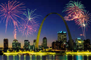 St. Louis city skyline at night with fireworks.