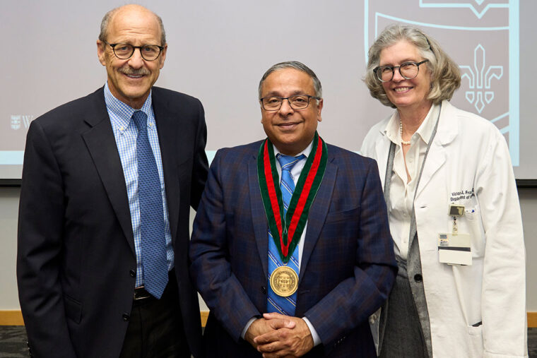 Abhinav Diwan, MD (center), of Washington University School of Medicine in St. Louis, has been named the inaugural Charlie W. Shaeffer, MD, Professor of Cardiology. He is shown at his installation ceremony with David H. Perlmutter, MD (left), executive vice chancellor for medical affairs, the George and Carol Bauer Dean of the School of Medicine, and the Spencer T. and Ann W. Olin Distinguished Professor; and Victoria J. Fraser, MD, the Adolphus Busch Professor and head of the Department of Medicine. (Photo: Dan Donovan/Washington University)